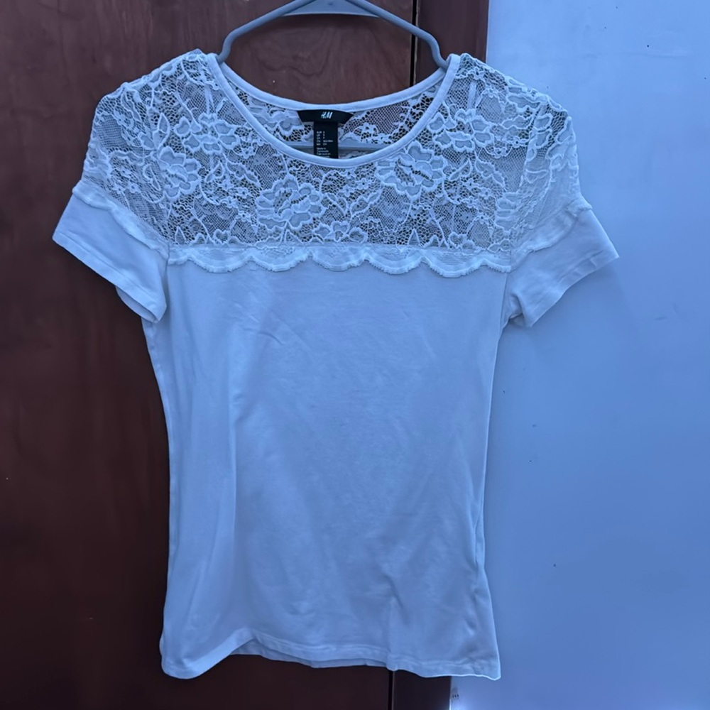 White top with floral lace on collar